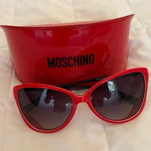 Moschino Red Sunglasses with Striped Arms.